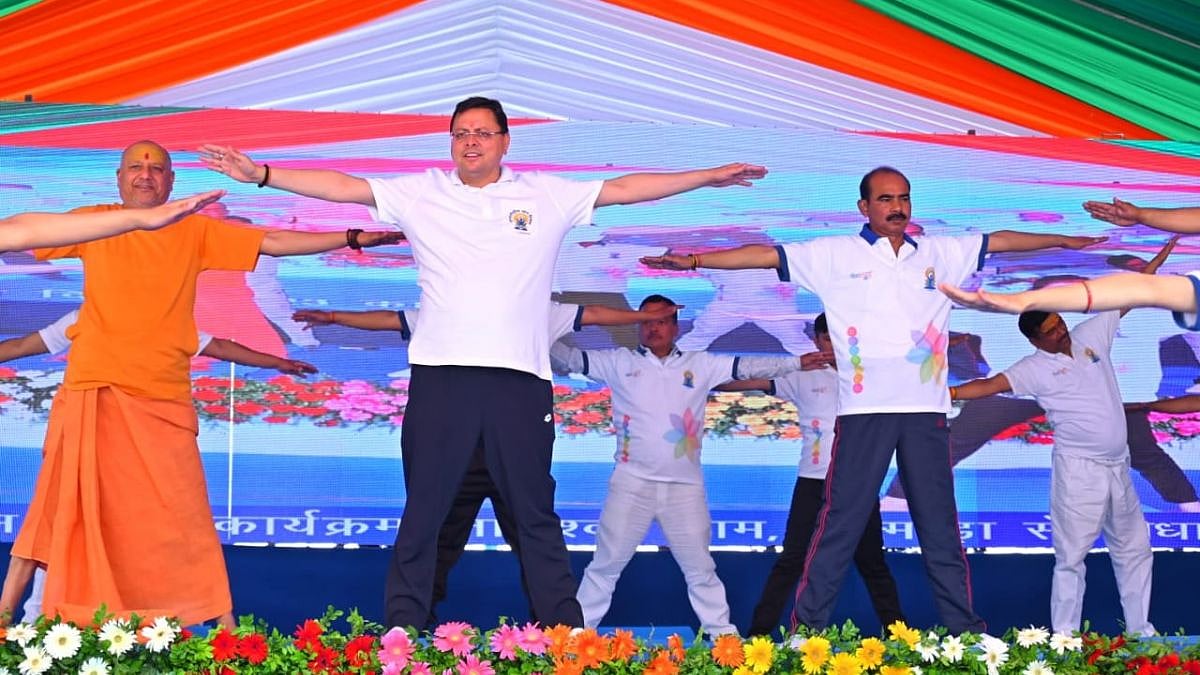 WATCH: Uttarakhand CM Pushkar Singh Dhami observes Yoga Day 2023 at Almora's Jageshwar Dham, exercises with Baba Ramdev