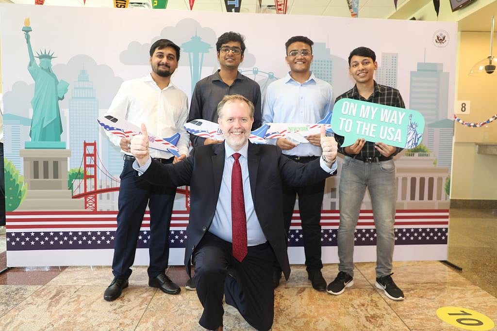 Consular Chief, U.S. Consulate General Mumbai, John Ballard poses with students on Student Visa Day.