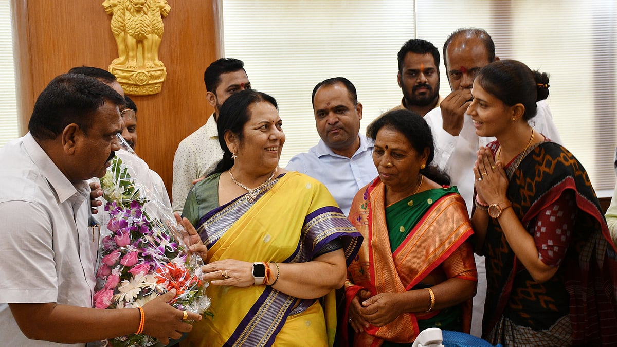 Supporters congratulating Dr Neelam Gorhe