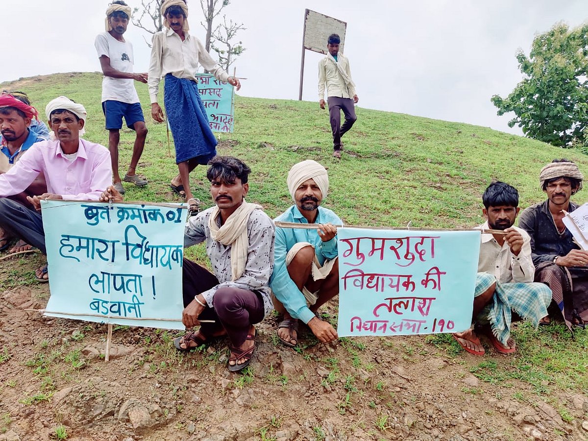 Villagers holding there placards