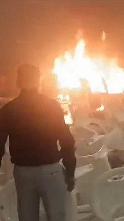 People rush to save themselves after a blast at a convention centre in Kalamassery in Ernakulam district.