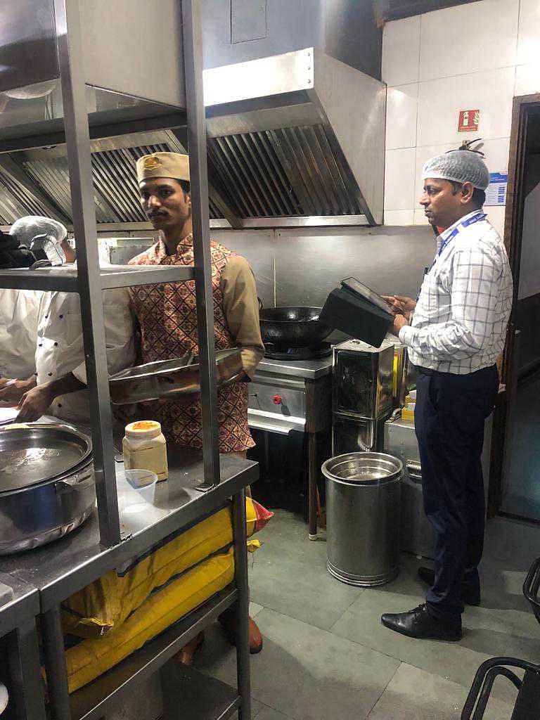 FDA officials inspecting sweet shop in Mumbai