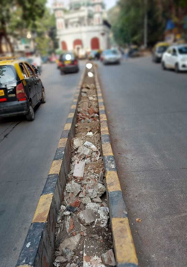 This is beautification BMC style. The road divider near Gol Masjid at Dhobi Talao has become a place for garbage and debri dumping.