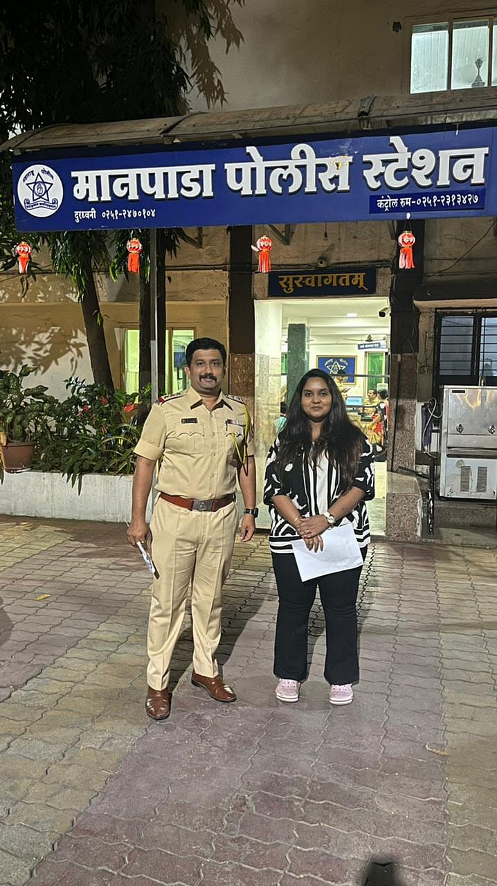 Activist Sonali Waghmare with police after getting a complaint lodged