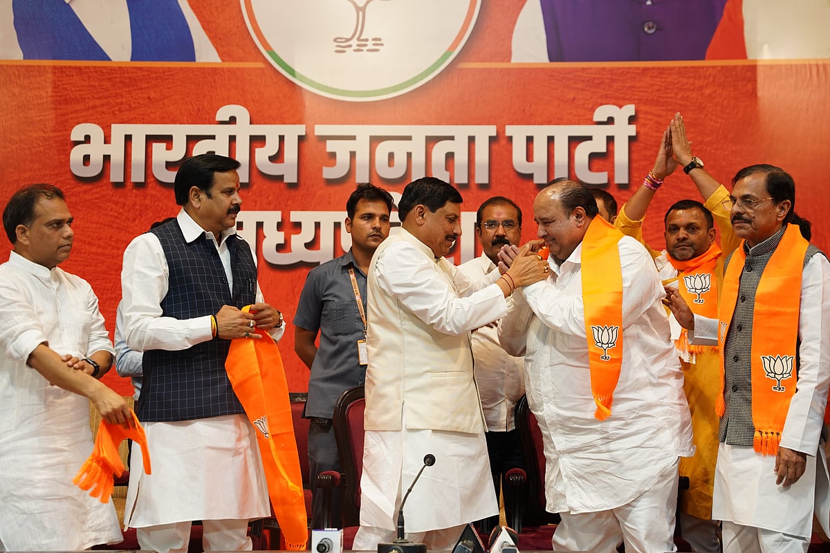 Kamal Nath's close aide and former minister Deepak Saxena taking BJP membership on Friday in presence of MP CM Mohan Yadav at the BJP state office in Bhopal.