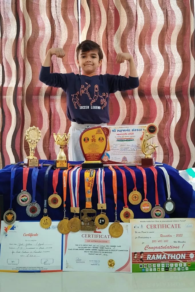 Yati with his medals and certificates. Photo courtesy: Ravi Jethva