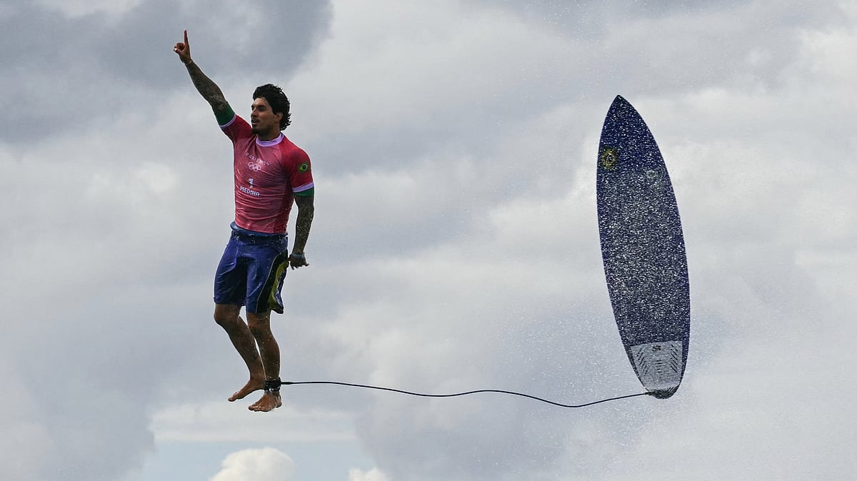 Gabriel Medina's gravity defying celebration | Credits: AFP photographer Jerome Brouillet