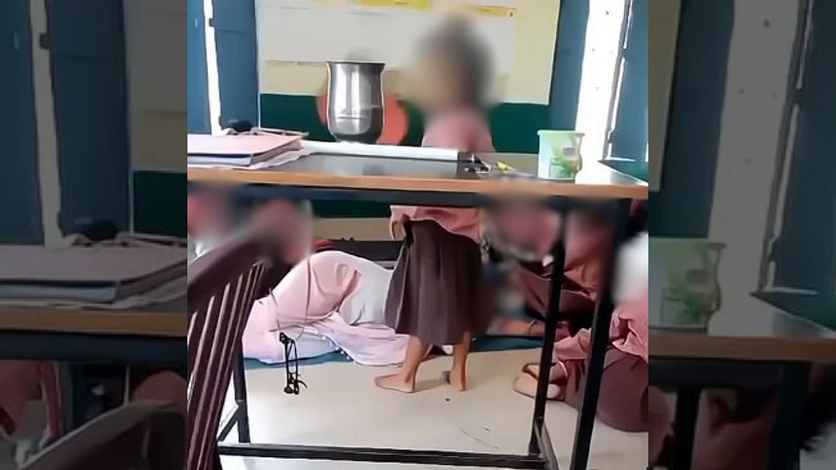 Primary School Teacher Caught Sleeping Inside Class, Kids Fan Her Amid Scorching Heat In UP's Aligarh | X