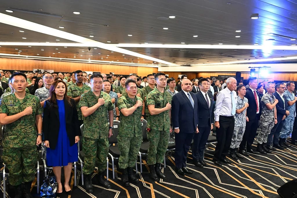 Minister for Defence Dr Ng Eng Hen (eighth from left) officiates at the East Zone Combined Rededication Ceremony (CRC), attended by Operationally Ready National Servicemen (NSmen), employers and senior SAF commanders. Photo courtesy: MINDEF Singapore
