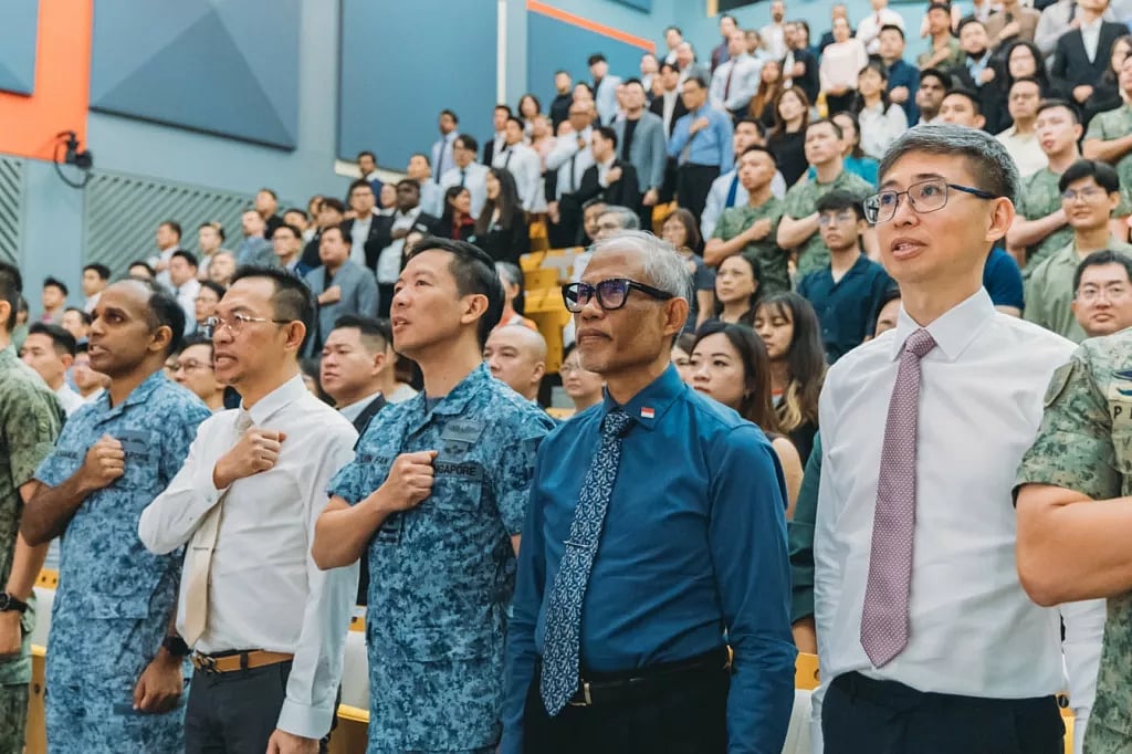 Minister for Social and Family Development, Second Minister for Health and Minister-in-Charge of Muslim Affairs Masagos Zulkifli (fourth from left) officiating the SAF Pledge with NSmen, employers and senior SAF commanders at the North/North-East Zone CRC. Photo courtesy: MINDEF Singapore
