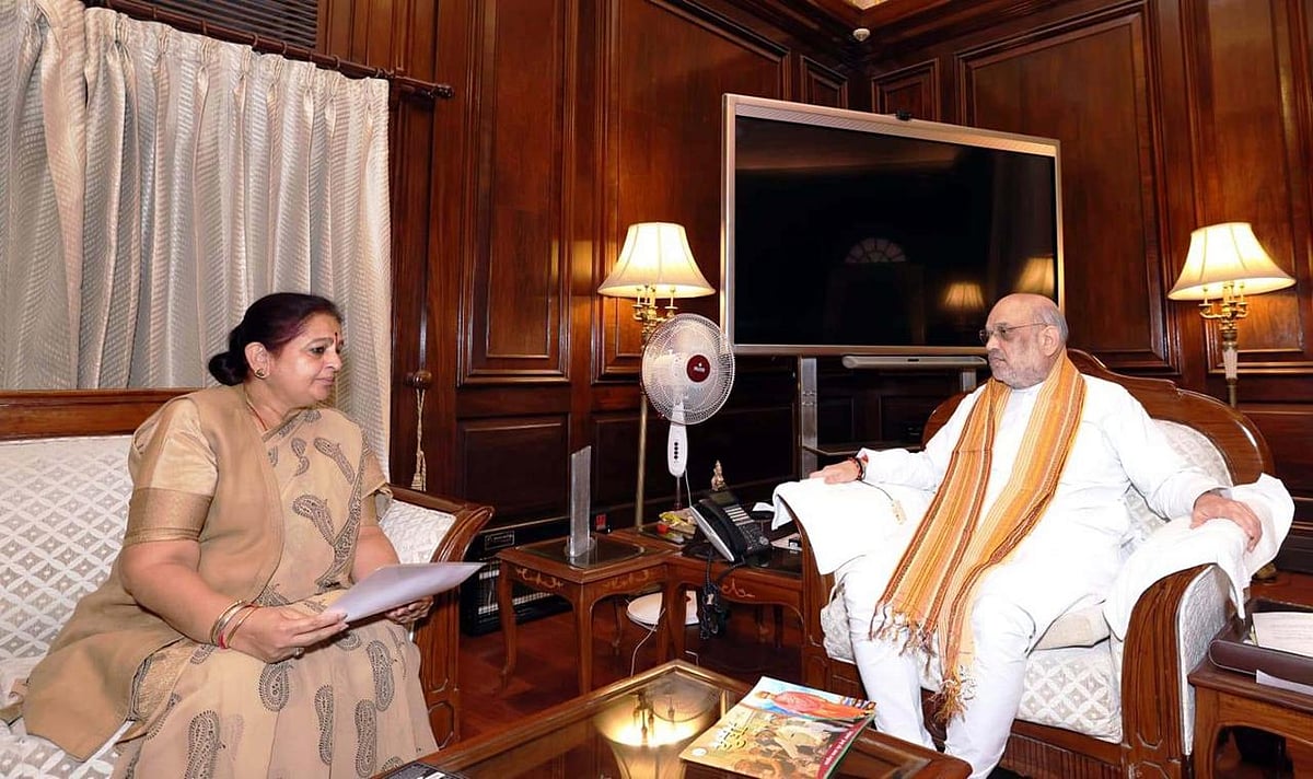 Amit shah & Archana Chitnis. |