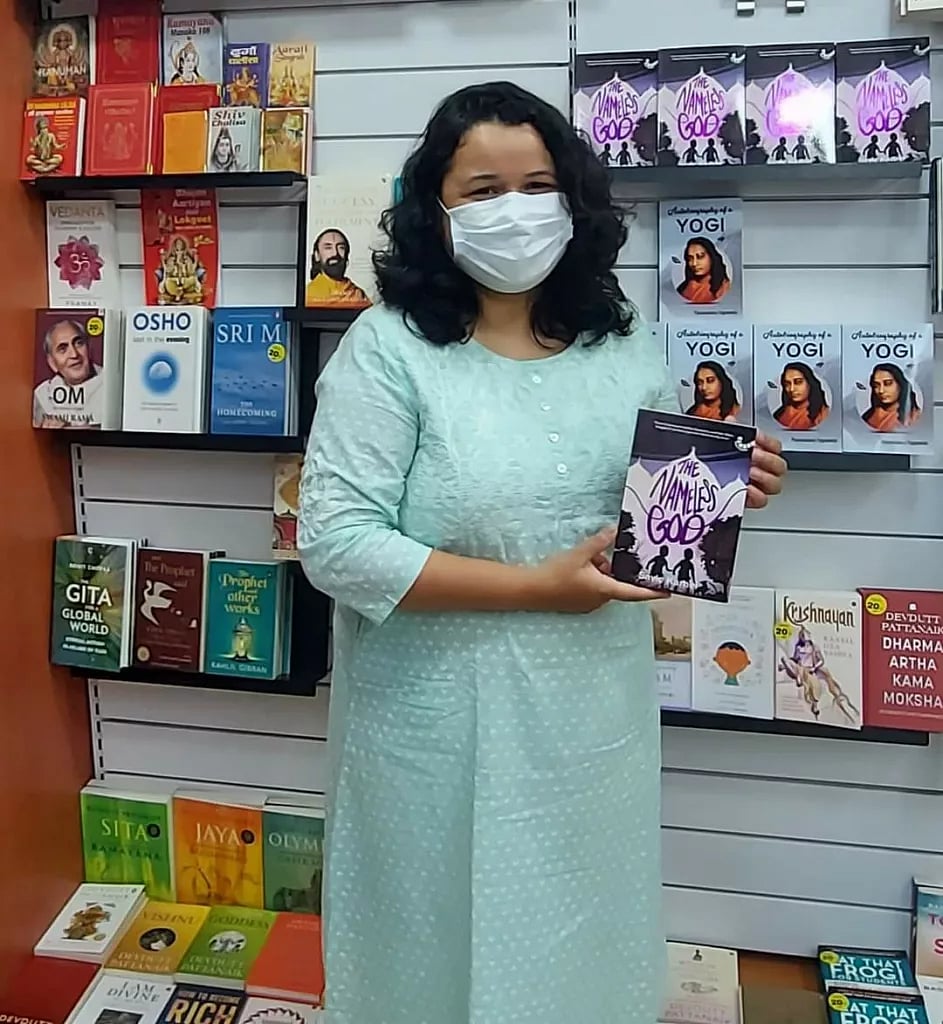 Savie Karnel with her first book, The Nameless God, released in the middle of the COVID-19 pandemic. Photo courtesy: Sameer Srivastava