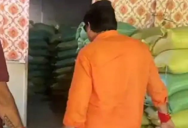Action against illegal storage of rice sacks |