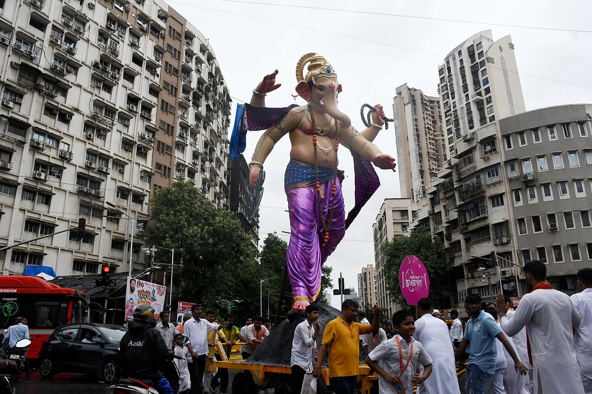 Ahead of Ganeshotsav, devotees carry an idol of Tardeocha Icchapurti to their
pandal at Mumbai Central 