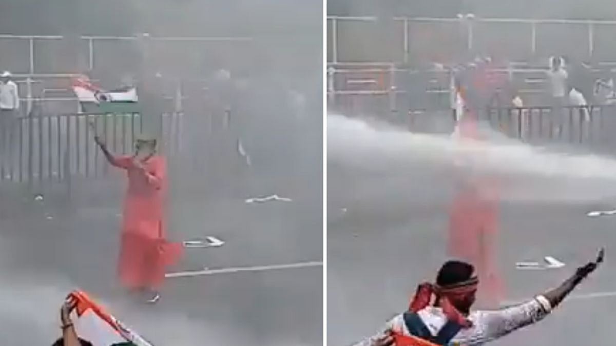 Kolkata Nabanna Abhijan March: Elderly Man In Saffron Robe Braves Water Cannon As He Waves National Flag, Video Viral