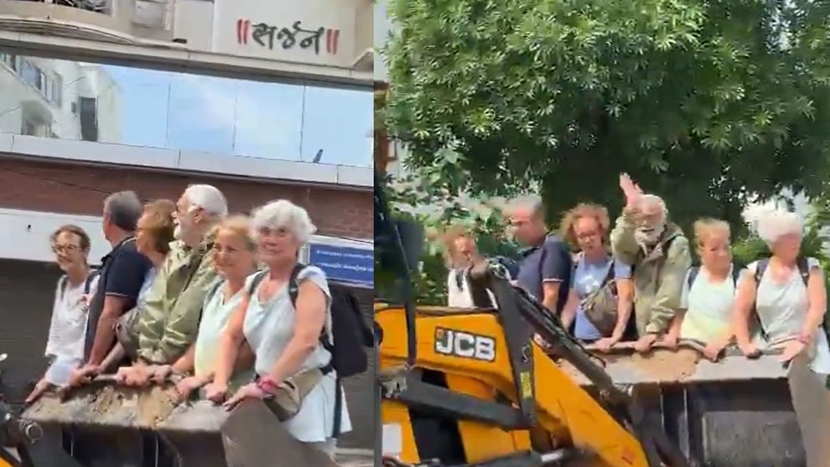 Video showing six foreigners being rescued on a JCB in Vadodara amid heavily flooded roads | Screengrab from X video/ @amitsahujourno