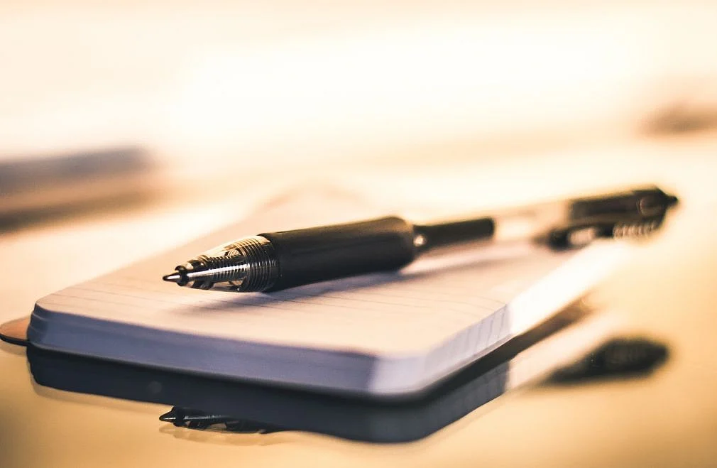 Pen and book