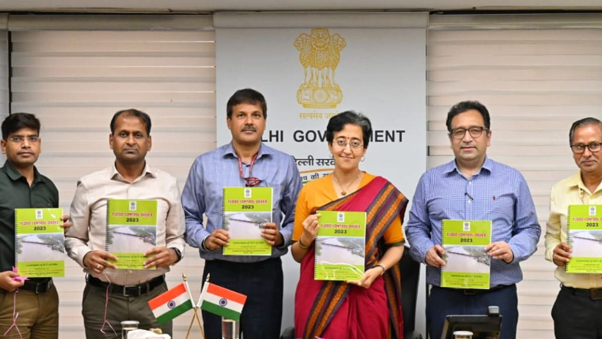 Atishi with officials of Delhi government on July 6, 2023