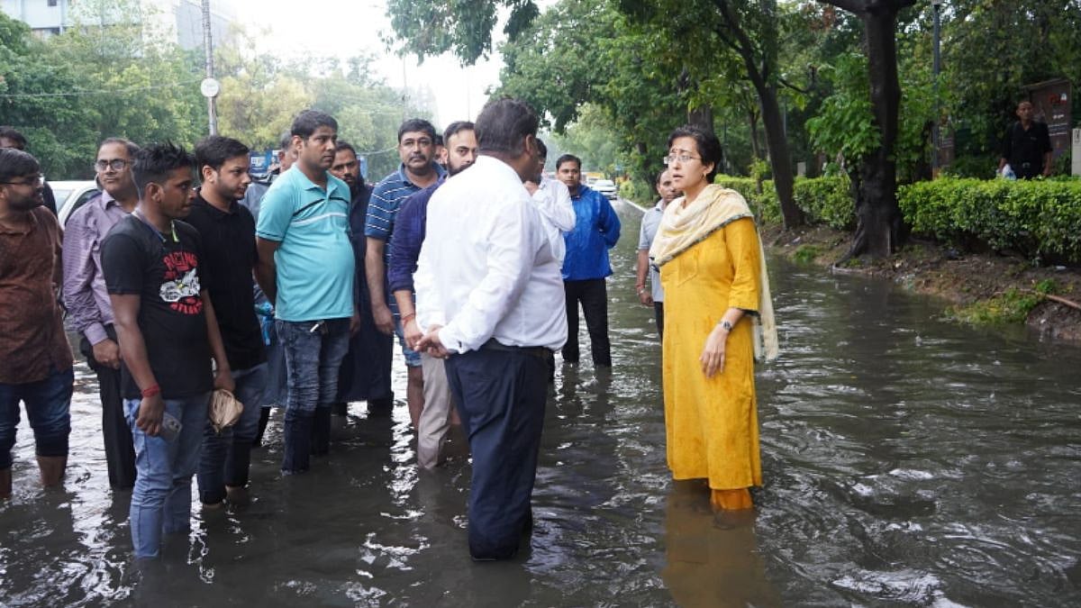Atishi on streets during heavy rains and water-logging in Delhi on July 9, 2023