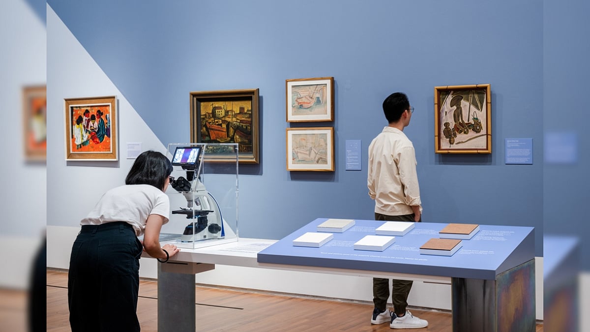 Visitors can use technology to view the paintings.