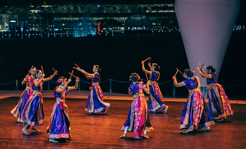 Kolattam is an ancient folk dance form from South India, performed by all ages. Photo courtesy: Esplanade – Theatres on the Bay
