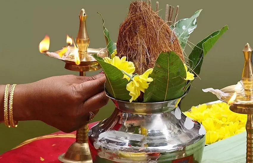 placing coconut in kalash