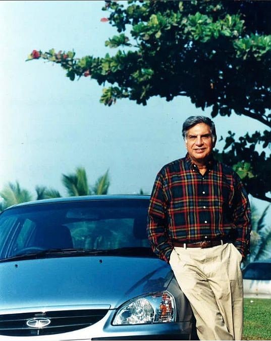 Late Ratan Tata posing with Tata Indica car