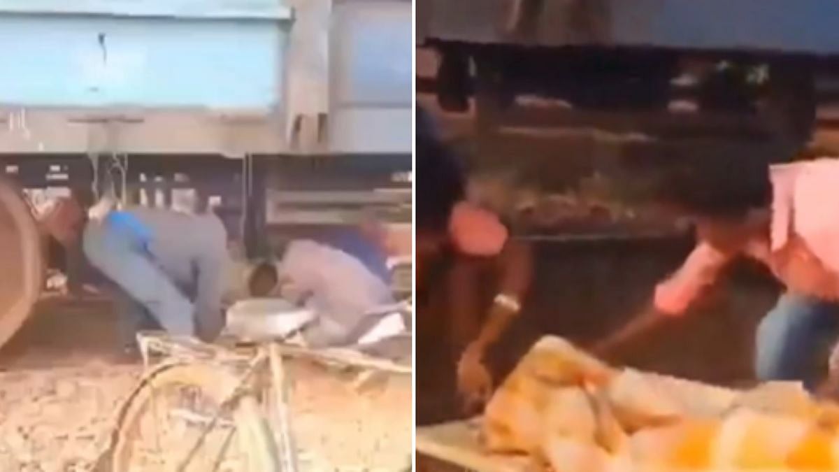 Shocking Video: Men, Carrying Patient On Stretcher, Cross Railway Track From Under Stationary Goods...