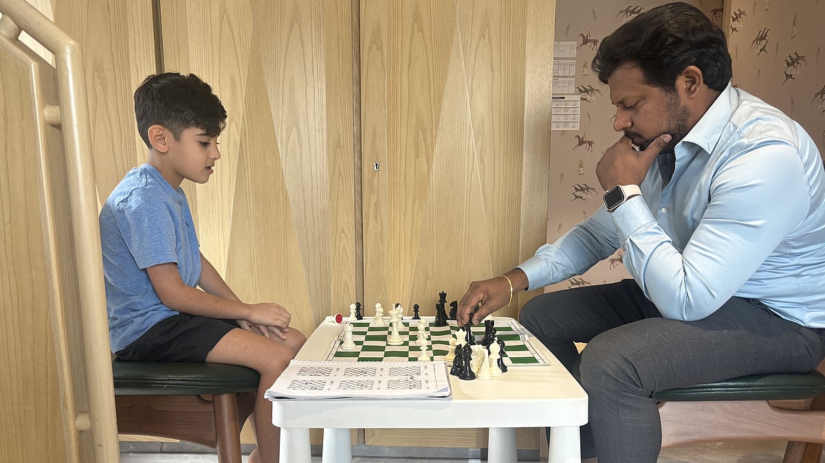Zian Jay Nagrecha with his coach Durga Nagesh Guttula |