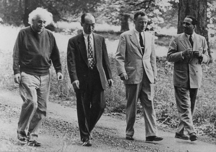 Physics Photo Of the Day: (L-R) Physicists Albert Einstein, Hideki Yukawa, John Wheeler, and Homi J. Bhabha in conversation as they walk through Marquand Park in Princeton, New Jersey, ca. 1954.