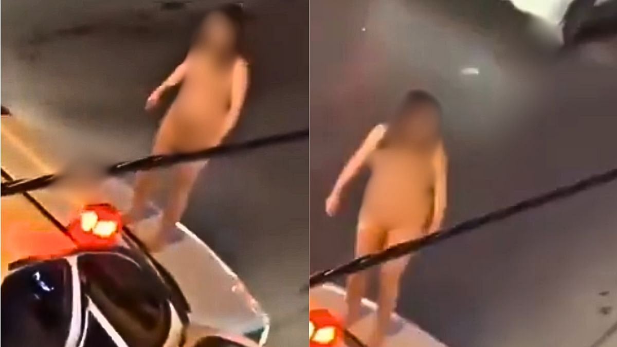 Shocking! Iranian Woman Undresses And Jumps Unclothed Onto Police Car In Mashhad; Incident Caught On Camera