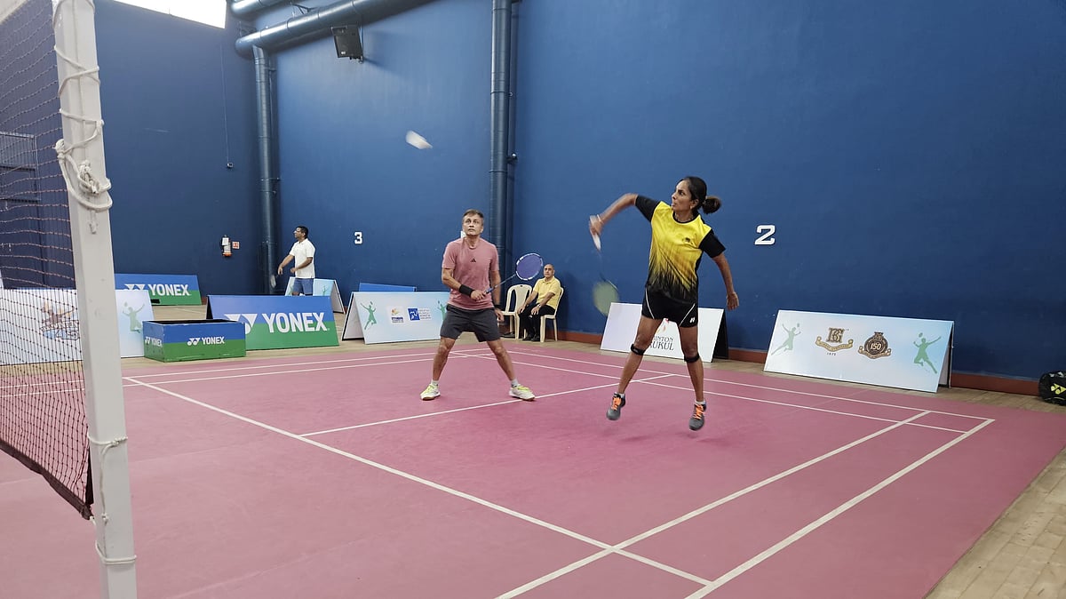 Aparna Popat and Shailesh Daga in action at G D Birla Badminton at Bombay Gymkhana. |