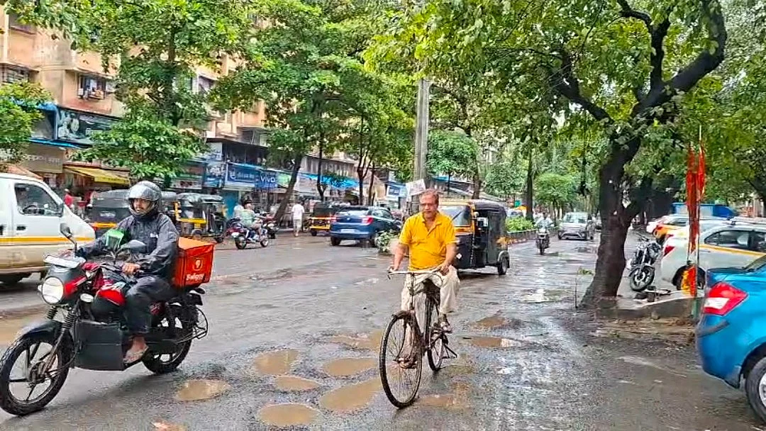 Potholes Near Manmohan Sweets Junction