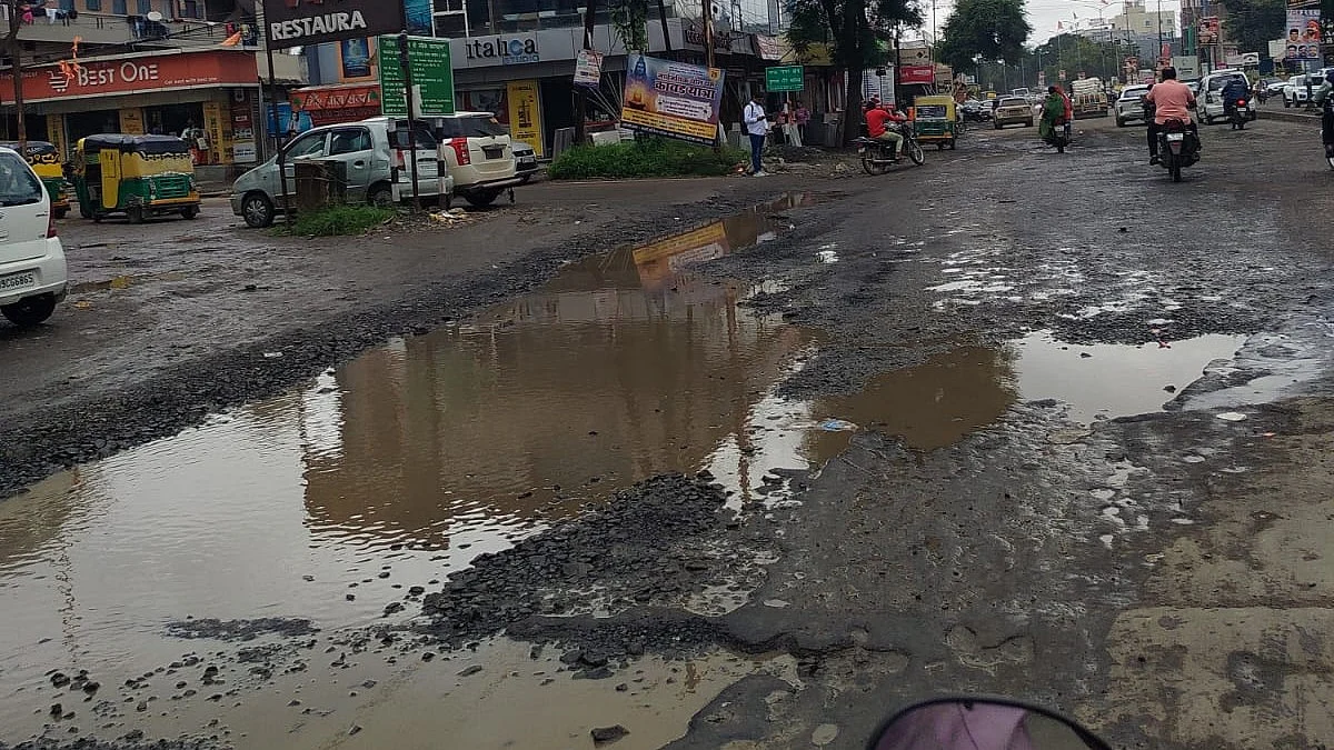 Madhya Pradesh: Perilous Potholes Plague Rau And Agra-Bombay Highway Overpass, Endangering Commuters | FP Photo
