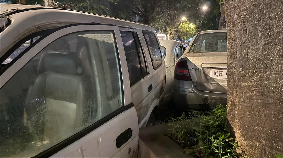 Rusting Ambassador and other abandoned cars near Nishtha Bhavan, New Marine Lines, Mumbai