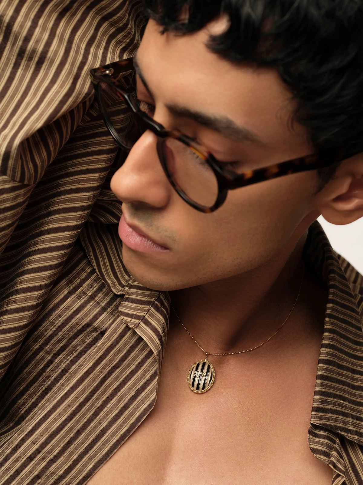 Sabyasachi Tiger Stripe necklace with house insignia