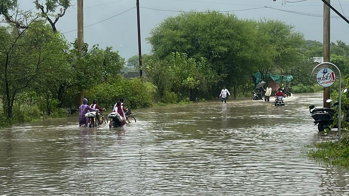 Madhya Pradesh: Commuters Risk Lives Daily To Cross Submerged Sailana Road | FP Photo