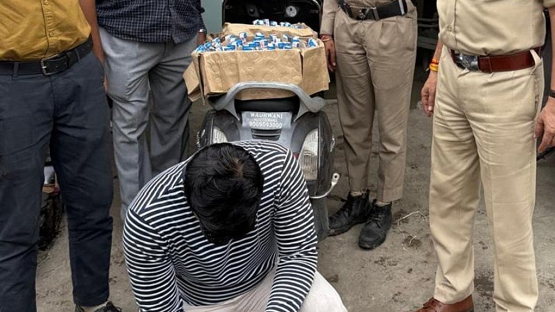 Indore: Man Carrying Liquor Illegally Worth Thousands Of Rupees On Scooter Arrested