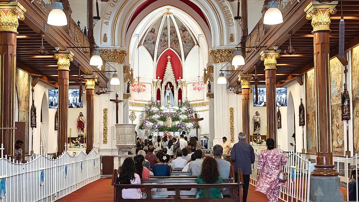 People pray at Mount Mary