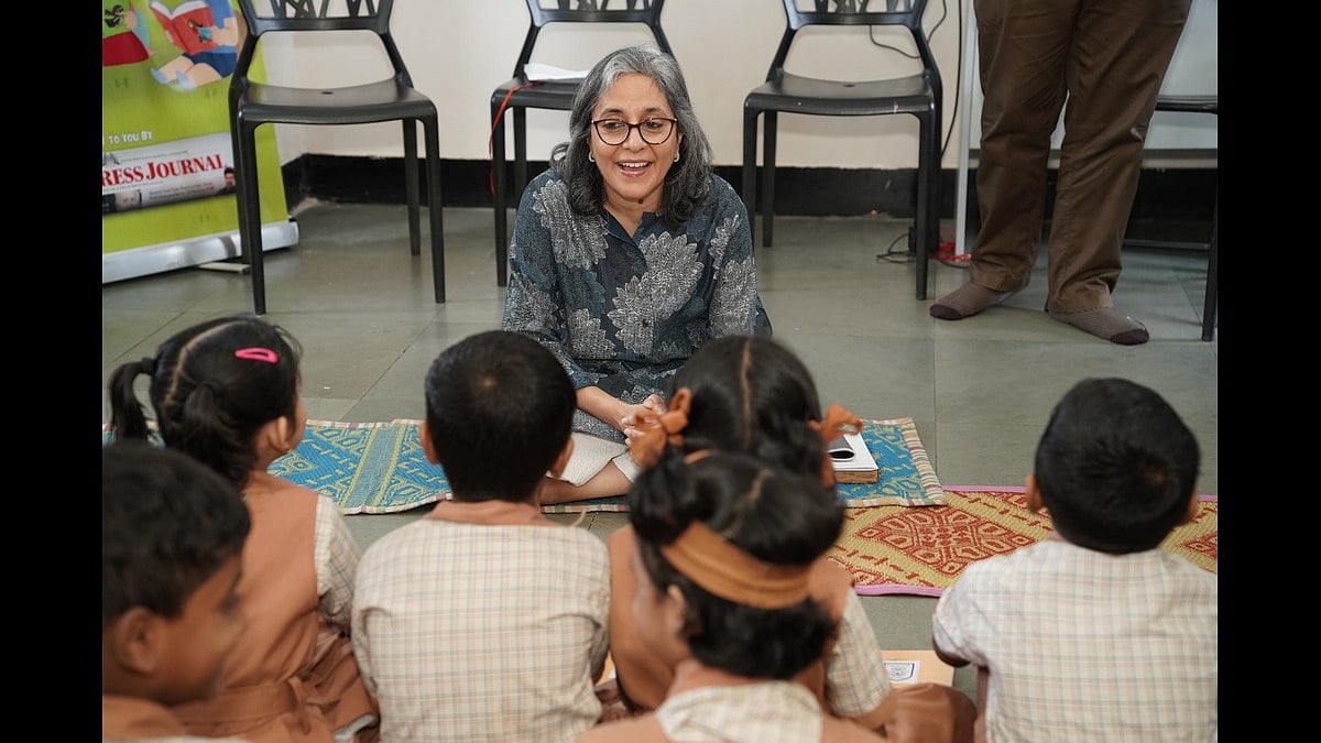 Amita Chauhan, all-India board member of Social Venture Partners India, addresses the Class I students of Khoj School after inaugurating a children's book series based on the Angels Of Mumbai initiative