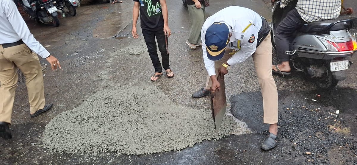 In Pics: Kandivali Traffic Police Repair Pothole To Prevent Accidents After BMC Inaction