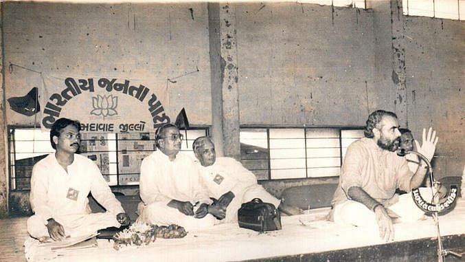 Modi addressing a party meeting in Ahmedabad
