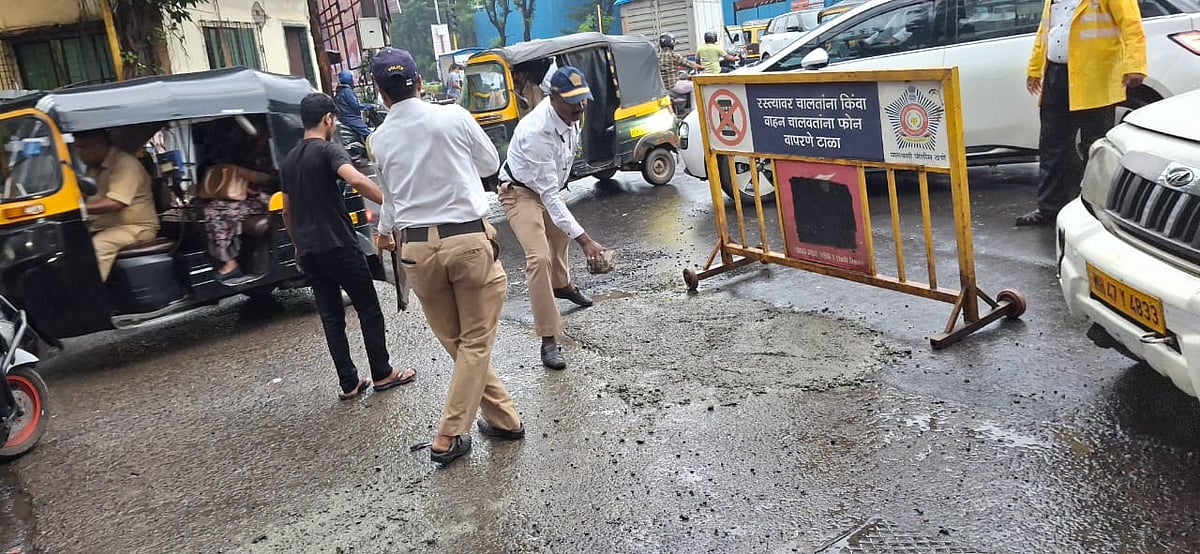 Kandivali Traffic Police Repair Pothole To Prevent Accidents After BMC Inaction