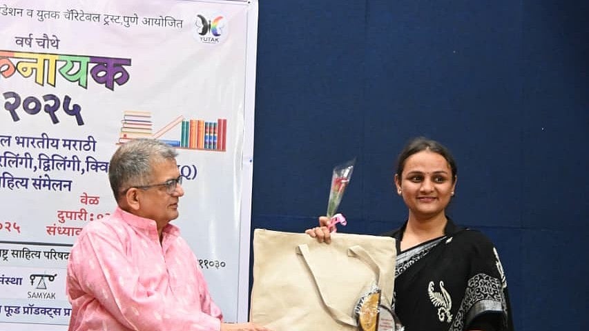Amrita Dube being felicitated