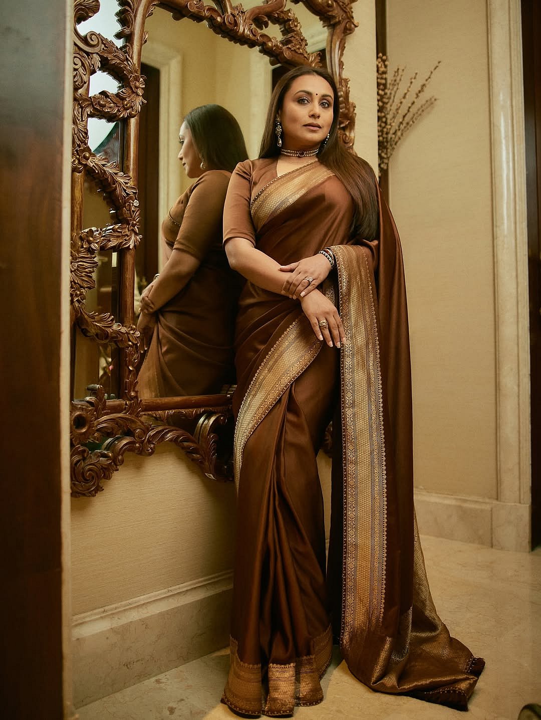 She paired it with a handwoven satin Katan silk blouse