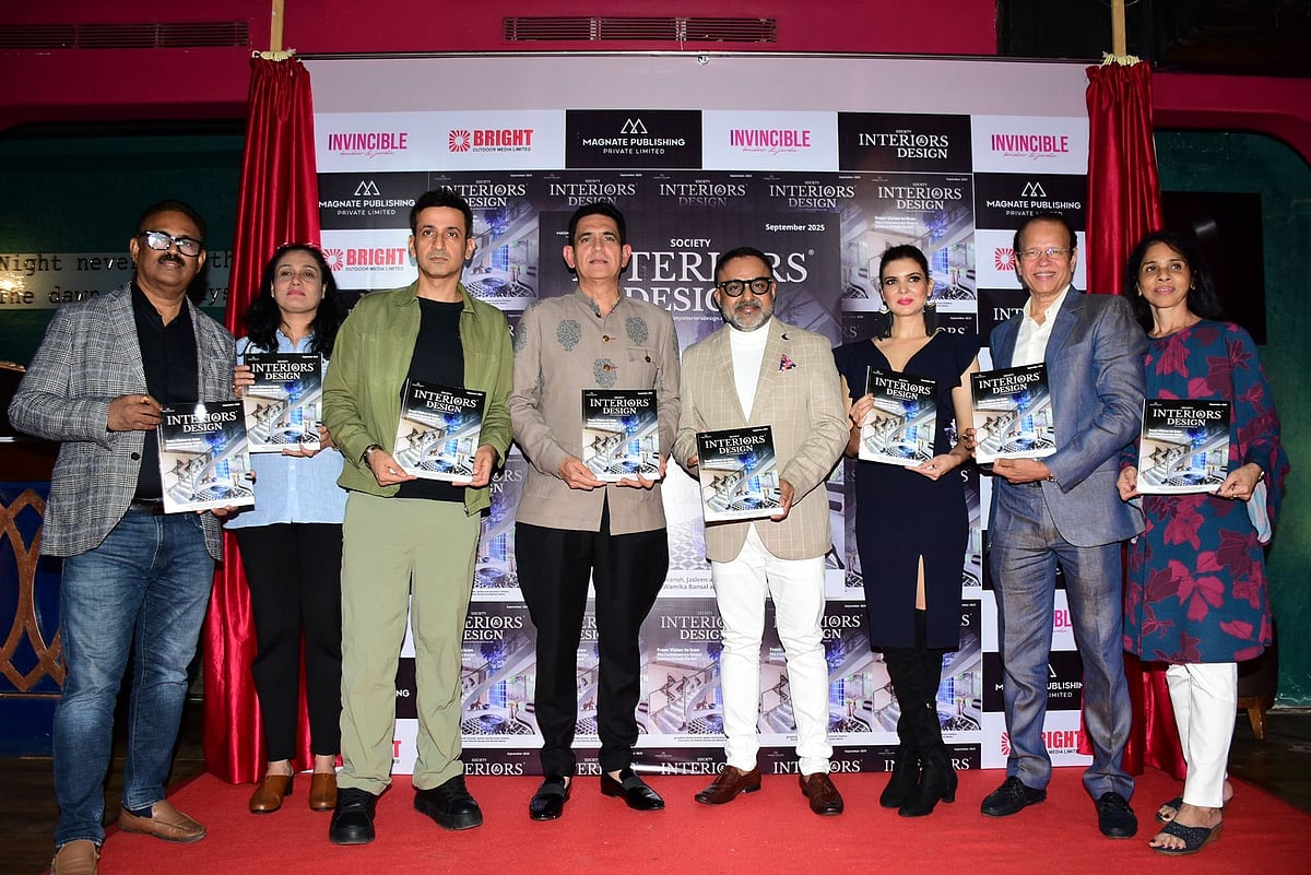 Ashok Dhamankar poses with the guests as they unveil the magazine
