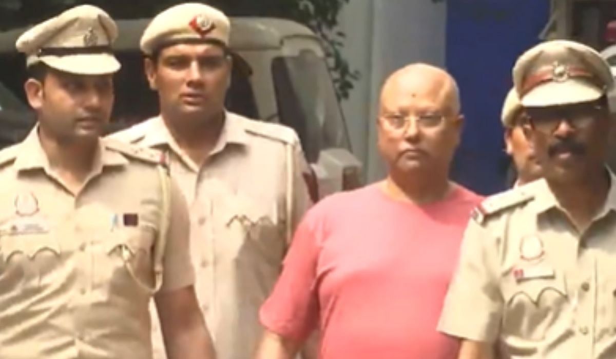 Chaitanyananda Saraswati with cops | ANI