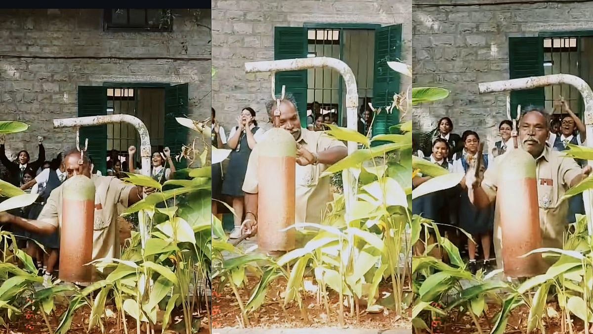 Das Uncle rings the school bell for the final time at Bishop Cotton School, Bengaluru, as students and teachers cheer in a heartfelt farewell. | Image: Insta/amikutty_