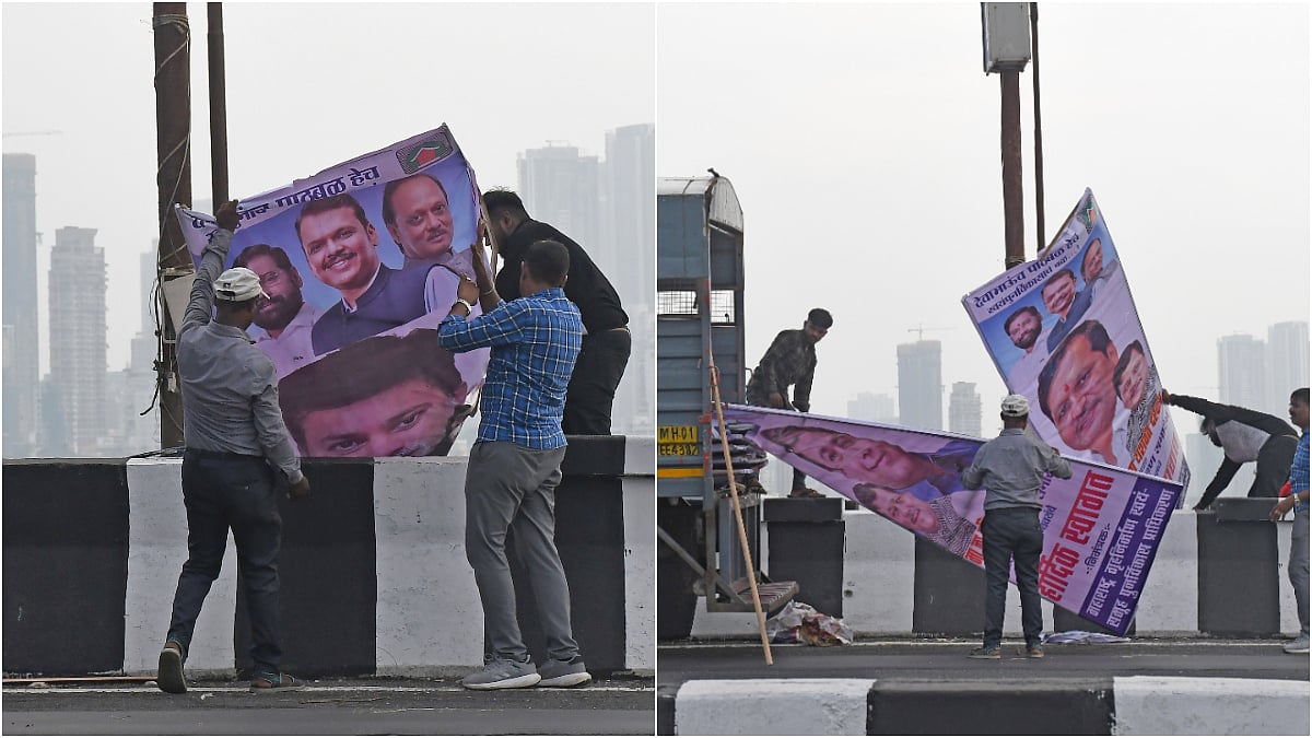 Civic workers dumped hoardings at their dumping station at Bandra Reclamation which is removed from the streets of Mumbai