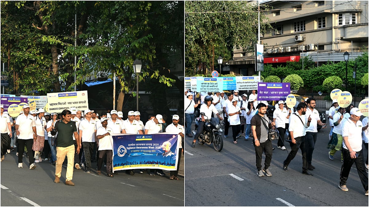 Indian Bank employees participate in a walkathon from Marine Drive to Fort to mark the commencement of Vigilance Awareness Week 2025